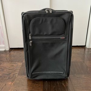 TUMI CARRY ON SUITCASE